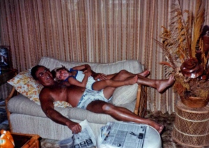 Heather and her Pop-pop watching TV, July 1985. Notice the Florida tans.